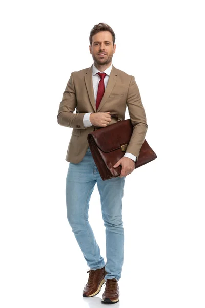 Young Handsome Businessman Posing His Briefcase Proudly White Background — Stok fotoğraf