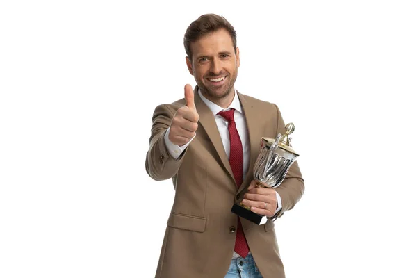 Sexy Businessman Giving Thumbs Holding Trophy His Hand White Background — Stok fotoğraf
