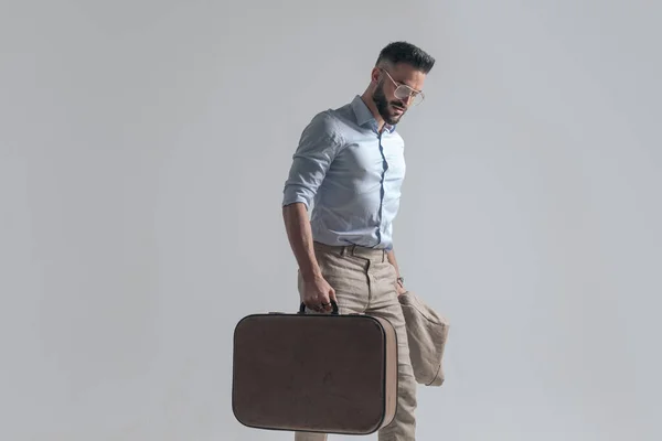 Portrait Confident Young Man Suitcase Jacket Looking Walking Isolated White — Fotografia de Stock