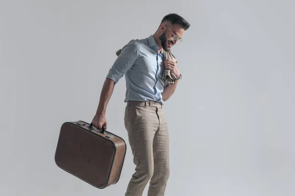 Side View Smiling Young Guy Jacket Shoulder Looking Holding Suitcase — Fotografia de Stock