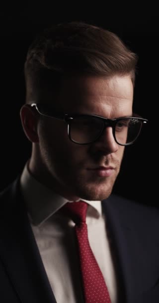 Project Video Thoughtful Young Businessman Glasses Adjusting Tie Looking Side — Stock Video