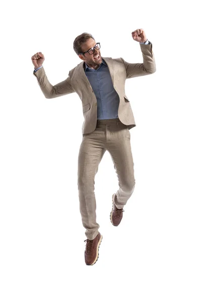 Excited Businessman Jumping Raising His Arms Air Celebrating Wearing Eyeglasses — Stock Photo, Image