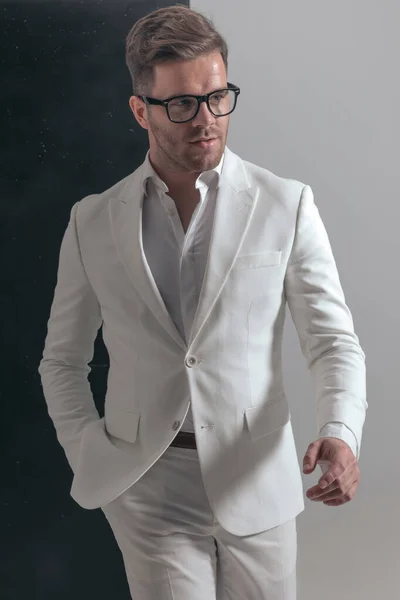 Sexy Businessman Walking One Hand Pocket Looking Away Wearing Eyeglasses — Stock Photo, Image