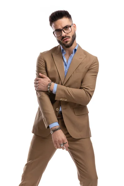 Unshaved Sexy Businessman Glasses Holding Elbow Fashion Pose While Standing — стоковое фото