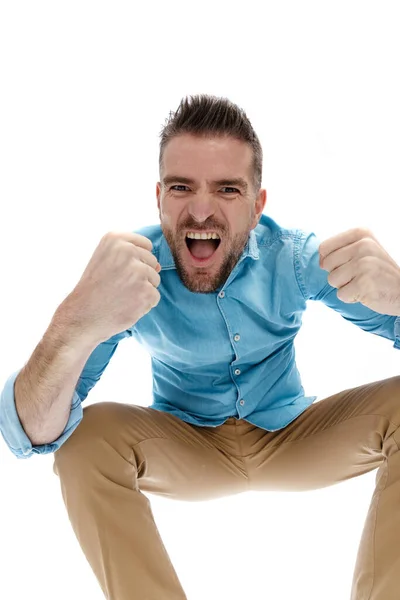 Low Angle View Excited Guy Chino Pants Holding Fists Screaming — Stock Photo, Image