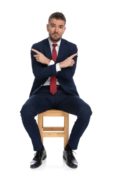 Confused Guy Elegant Suit Pointing Fingers Both Directions Making Funny — Stock Photo, Image