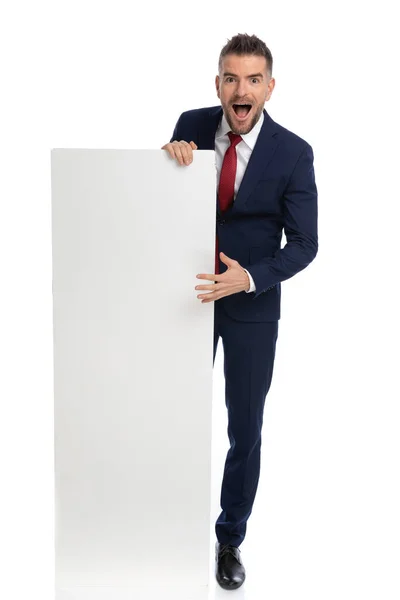 Businessman Excited Present Something His Vertical Billboard White Background — Stock Photo, Image