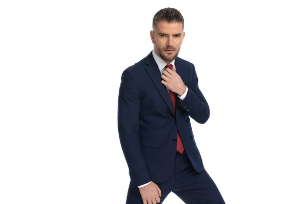 Cool Businessman Fixing His Tie Looking Deep Camera Tough Attitude — Stock Photo, Image