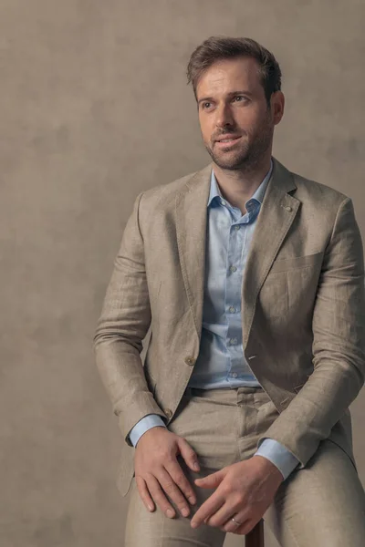 Handsome Businessman Subtle Smile His Face Sitting Chair Looking Away — Stock Fotó