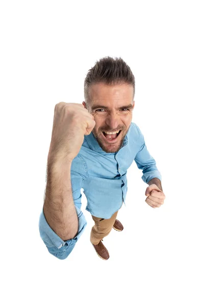 Enthusiastic Casual Guy Beard Holding Fist Celebrating Victory Top View — Stock fotografie