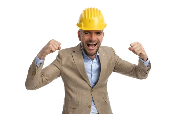 Happy Engineer Guy Helmet Holding Arms Air Celebrating Project Victory — Stockfoto