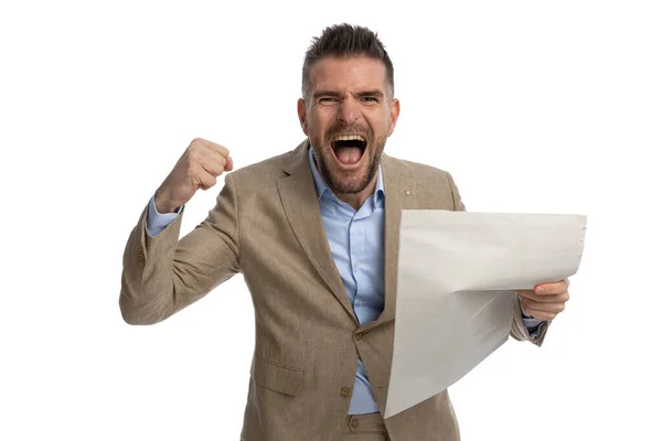 Enthusiastic Guy Holding Fist Cheering Great News Reading Newspaper Screaming — Foto de Stock