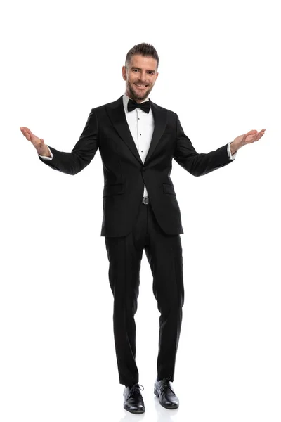 Young Smart Casual Man Greeting Guests Open Arms Smiling Wide — Stock Photo, Image