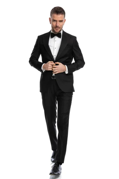 Young Handsome Businessman Arranging His Tuxedo While Walking Looking Camera — Stock Photo, Image