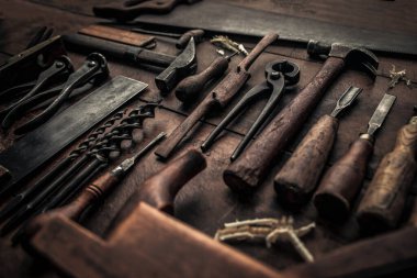 set of vintage tools for carpentry with pinces, chisels, drills, gouge and others for a grandious hand work 
