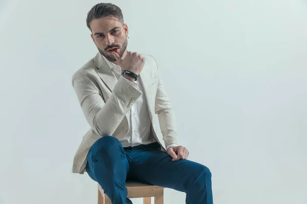 Sexy Unshaved Businessman Untied Shirt Sensually Touching Lips Sitting Wooden — Stok fotoğraf