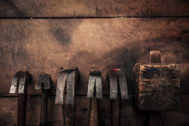 collection of vintage woodworking tools on a rough workbench and blank copy space : carpentry, craftsmanship and handwork concept
