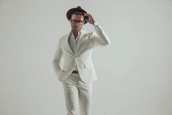 Sexy Businessman White Suit Hand Pocket Arranging Hat Moving Front — стоковое фото