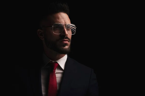 Cool Unshaved Businessman Glasses Looking Away Posing Front Black Background — Photo