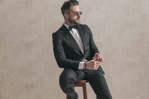 Cool Fashion Stylish Man Black Tuxedo Holding Elbow Knee Looking — Stockfoto