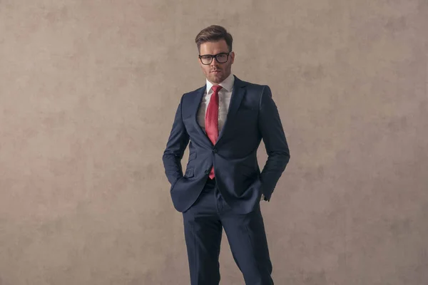Confident Young Guy Elegant Suit Glasses Holding Hands Pockets Posing — Stock Photo, Image
