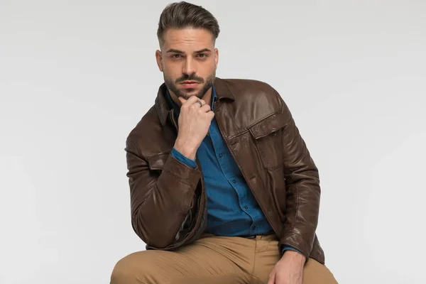 Portrait Thoughtful Man Denim Shirt Brown Leather Jacket Holding Hand — Stock Photo, Image