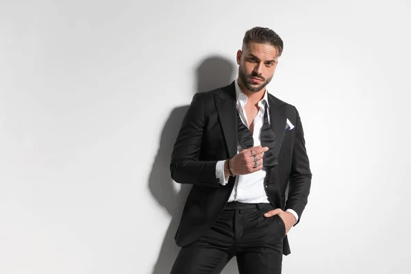 Attractive Businessman Arranging His Undone Bowtie Holding One Hand Pocket — Stock Photo, Image