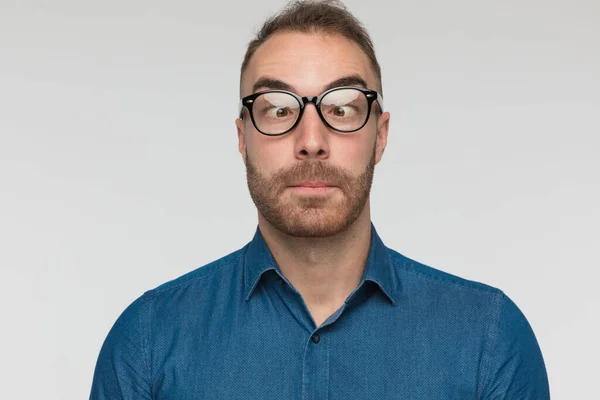 Handsome Casual Man Crossing His Eyes Goofing Wearing Eyeglasses — Stock Photo, Image