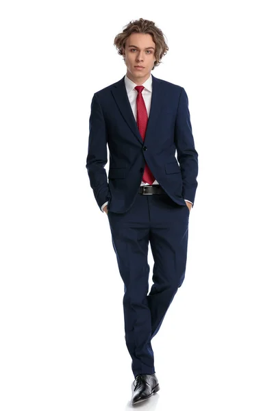 Sexy Businessman Elegant Suit Walking Hands Pockets Posing Front White — Stock Photo, Image