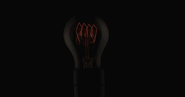 Ljusets Gnista Lämnar Långsamt Glödlampan Mörk Miljö — Stockvideo