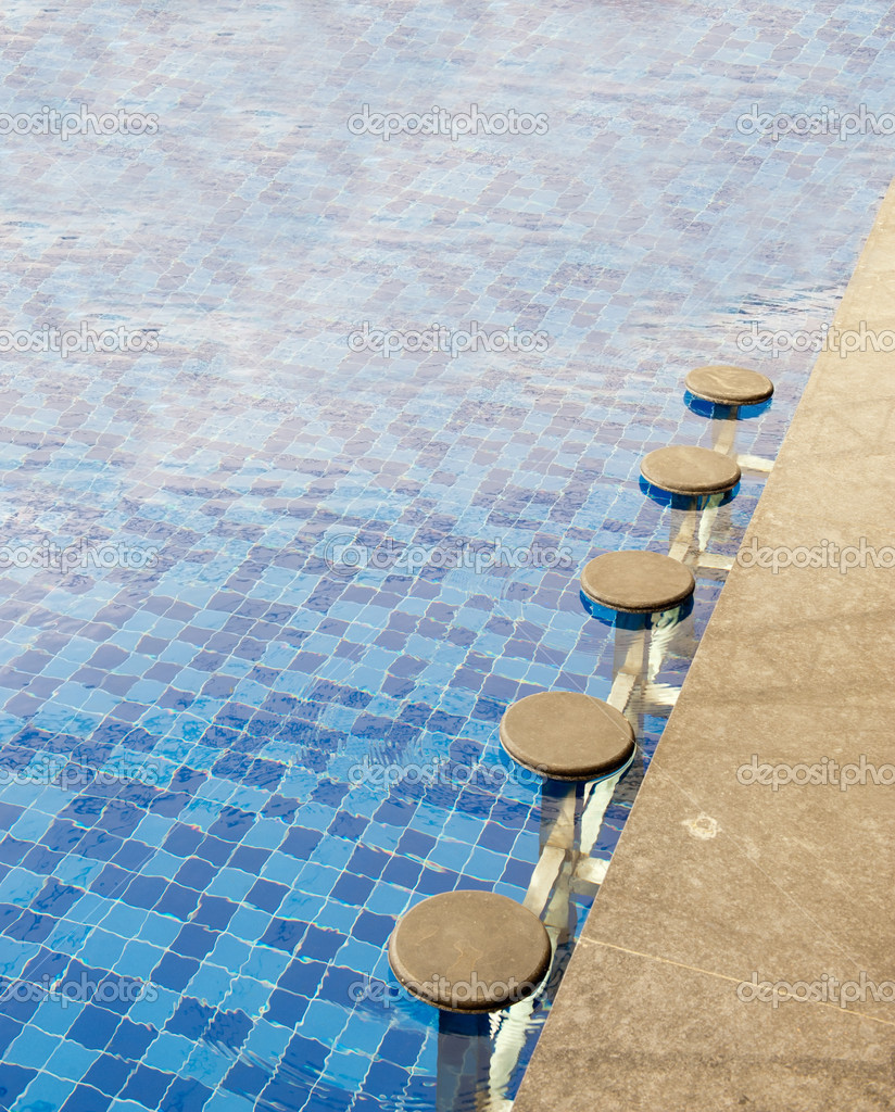 Swimming pool bar stools Stock Photo yellowcrest 12539707
