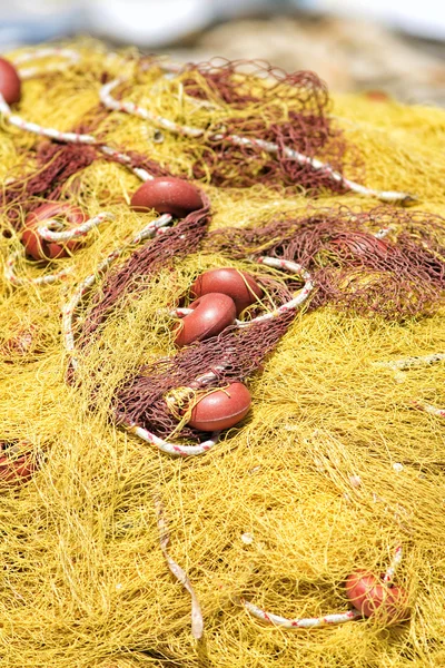 Old yellow fishing net — Stock Photo, Image