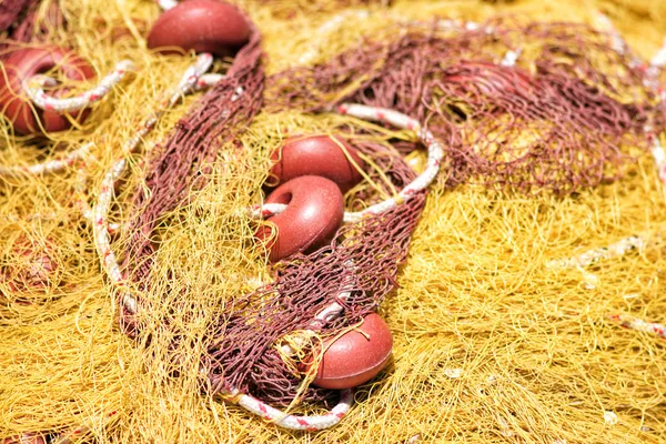 Old yellow fishing net — Stock Photo, Image