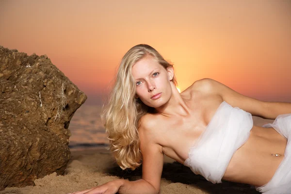 Beautiful young woman on the beach Royalty Free Stock Photos