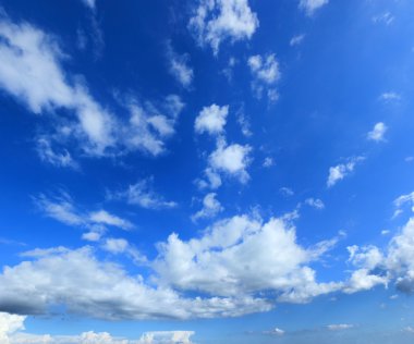 Cloudscape over blue sky clipart
