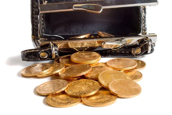Kvinnliga väska med guld mynt — Stockfoto