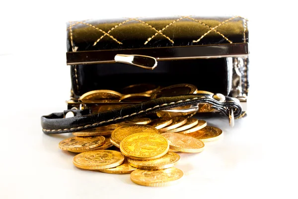 Female purse with gold coins — Stock Photo, Image