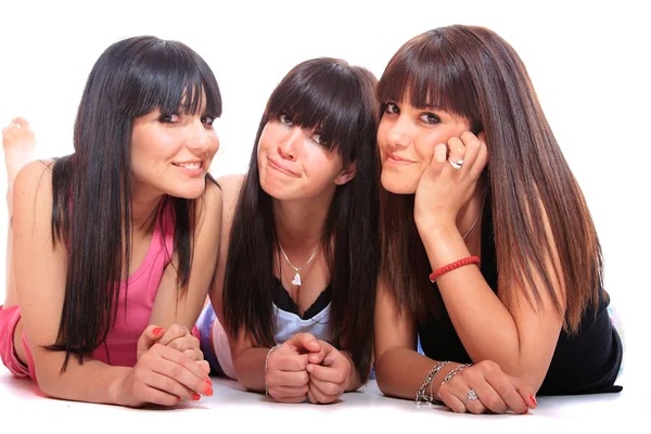 Group of three girls laying — Stock Photo, Image