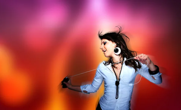 Young woman dancing at disco — Stock Photo, Image