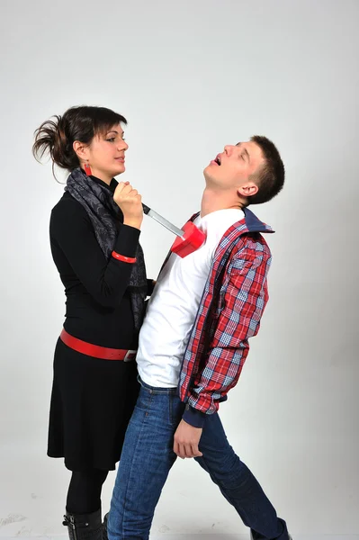 Couple with red heart and knife — Stock Photo, Image