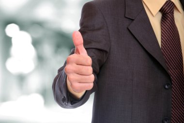 iş kadını başparmak kadar gösterir