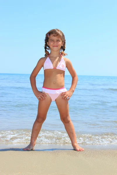 Little cute girl on the beach — Stock Photo, Image