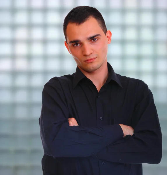 Businessman over glass wall — Stock Photo, Image