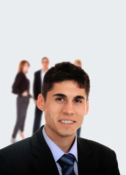 Líder de negócios em pé na frente de sua equipe — Fotografia de Stock