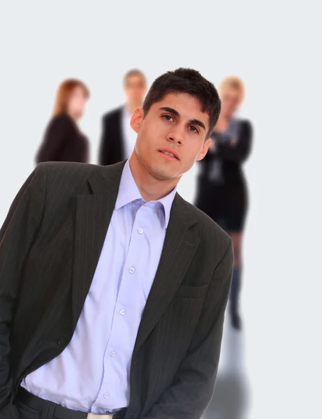 Business leader standing in front of his team — Stock Photo, Image