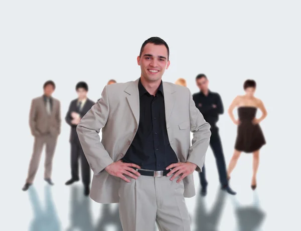 Business leader standing in front of his team — Stock Photo, Image