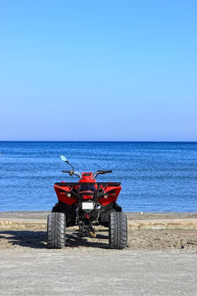 Fyrhjuling på stranden — Stockfoto