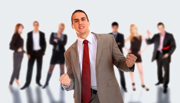 Business leader standing in front of his team Stock Photo