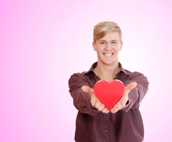 Young man with a gift box — Stock Photo, Image