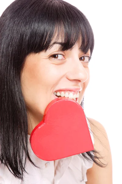 Woman holding a red heart — Stock Photo, Image